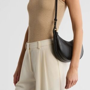 BCBG Black Crescent Shoulder Bag with Gold Hardware